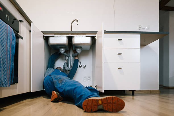 Professional Drain Cleaning technician working in Clay, NY
